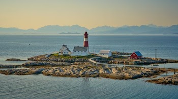 aerial photography of watch tower in the islet