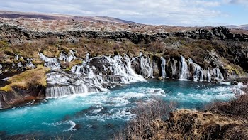 aerial photography of water falls at daytime
