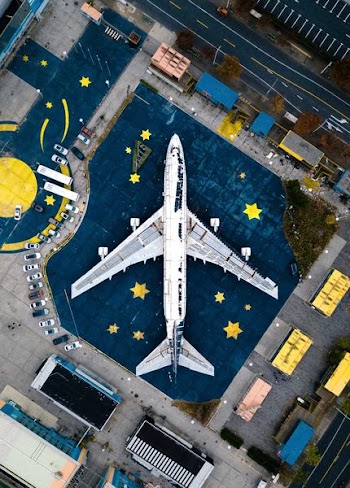 aerial photography of white and black air liner on airport during daytime