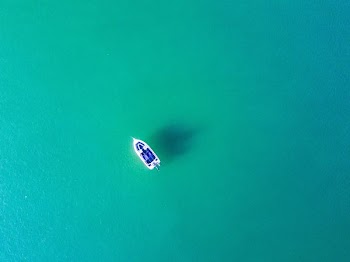 aerial photography of white sailing boat