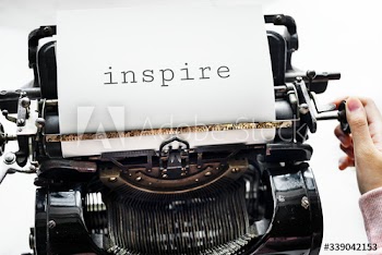 Aerial view a woman using a retro typewriter