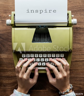 Aerial view of a man typing on a retro typewriter