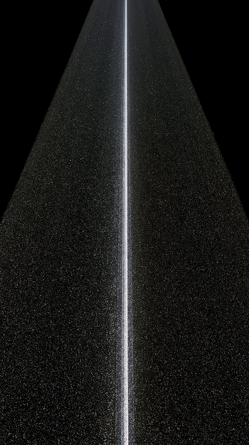 Aerial View of a Straight Graphite Asphalt Road