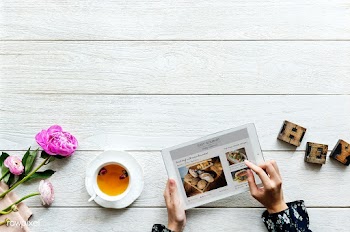 Aerial view of a woman using digital tablet c.. | Free stock psd mockup - 385126