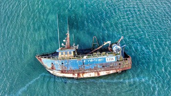 Aerial View of Blue and Brown Ship