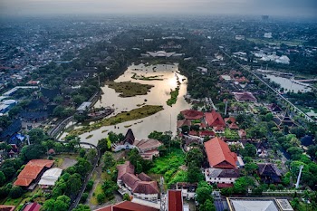 Aerial View of Building Near Body of Water