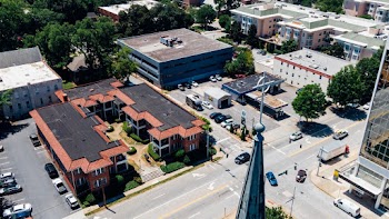 Aerial View Of Buildings Along The Road