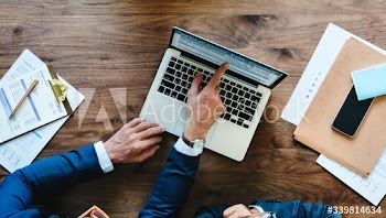 Aerial view of businessman using computer laptop