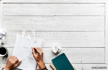 Aerial view of caligraphy artist working workspace concept with copy space