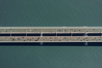 aerial view of cars on bridge