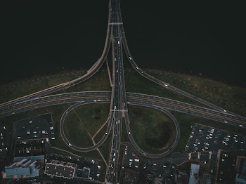 aerial view of city with body of water