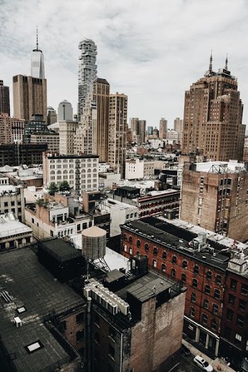 aerial view of city with high rise buildings