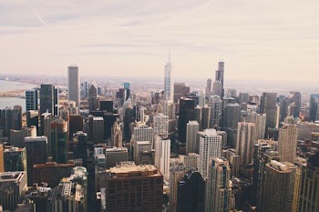 aerial view of city with skyscrapers