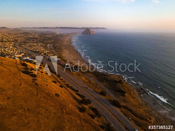 Aerial view of coastal road during sunset