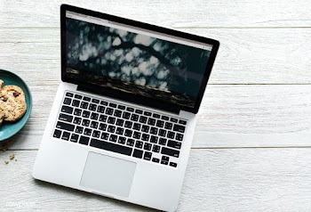 Aerial view of computer laptop and cookies on.. | Free stock psd mockup - 385074
