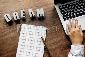 Aerial view of computer laptop on wooden table