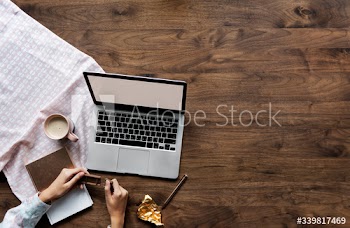 Aerial view of computer laptop on wooden table