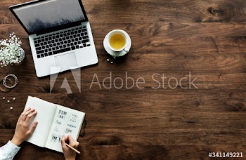 Aerial view of computer laptop on wooden table