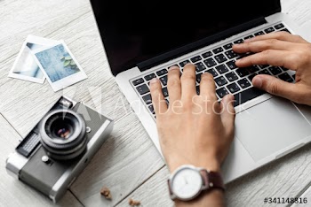 Aerial view of computer laptop on wooden table photography hobby concept