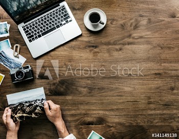 Aerial view of computer laptop on wooden table photography hobby concept