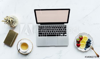 Aerial view of computer laptop with design space
