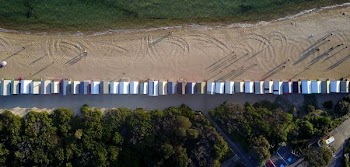 aerial view of house near seashore