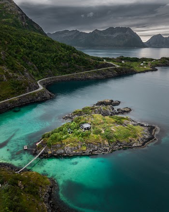 Aerial View of Island Next to Mountains