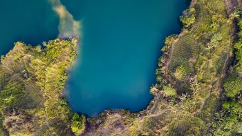 Aerial View of Land and Body of Water