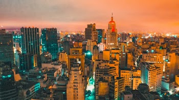 Aerial View of Lighted Buildings at Night
