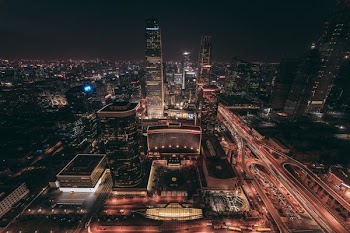 aerial view of lighted up buildings