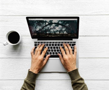 Aerial view of man using a computer laptop on.. | Free stock psd mockup - 385094