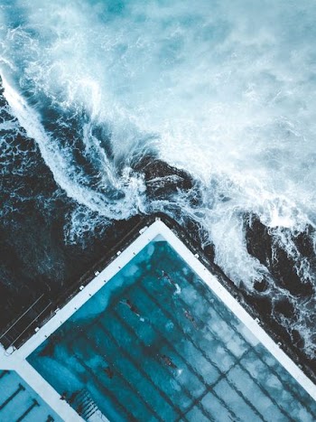 aerial view of ocean beside dock