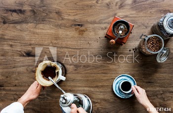 Aerial view of people making drip coffee