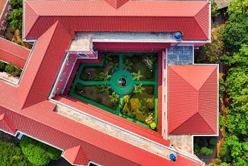 Aerial View of Red-Orange Roof Buildings and Trees