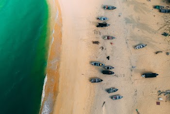 Aerial View of Row Boats on Seashore