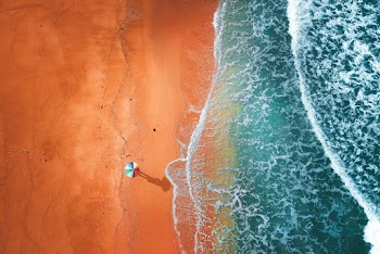 Aerial View of Umbrella on Seashore