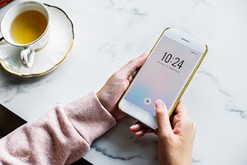 Aerial view of woman using a smartphone and a.. | Free stock psd mockup - 385010