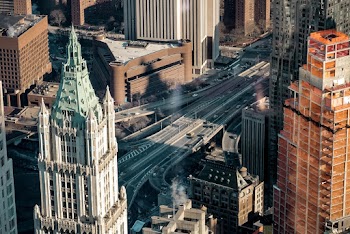 Aerial View Photo of Highways Beside Buildings