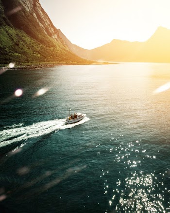 Aerial View Photo of Motor Boat on Sea