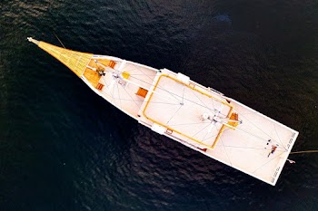 Aerial View Photography of a  Boat on a Body of Water