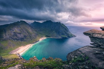 aerial view photography of body of water and mountains