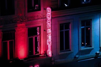 aerial view photography of Brassiere neon signage at night