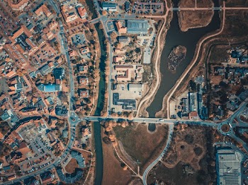 Aerial View Photography of Buildings Near Body of Water 