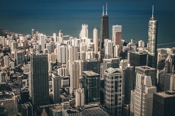 aerial view photography of city buildings near body of water