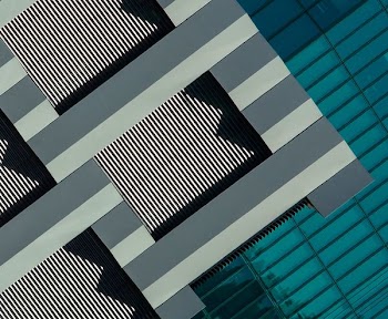 aerial view photography of grey and black concrete building