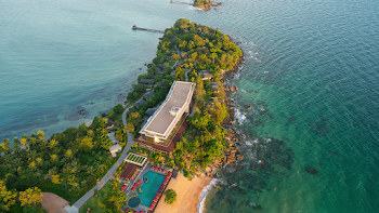 Aerial View Photography of Island Surrounded by Body of Water
