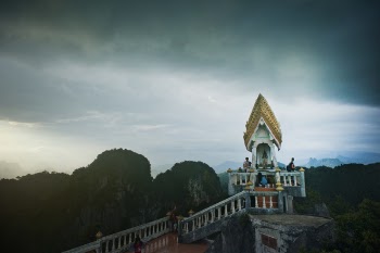 Aerial View Photography of Mountains Under Cloudy Sky