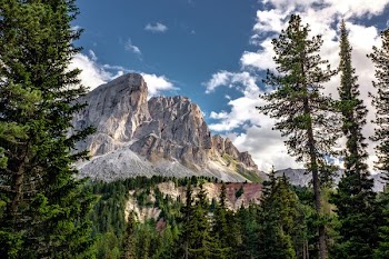 aerial view photography of rock mountain under blue skyt