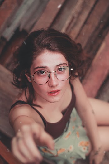Aerial View Photography of Woman About to Touch Camera