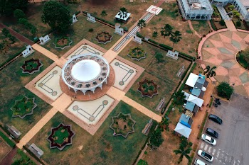 Aeriel View of Round Establishment Across Parking Lot
